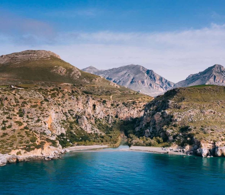 Visit the enchanting Preveli Beach by boat 